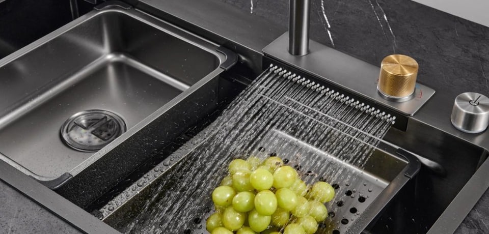 A complete kitchen sink system package for wholesale, featuring a stainless steel single bowl sink, pull-out faucet, soap dispenser, and drain basket.